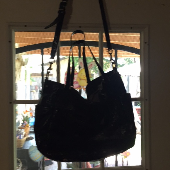 Black coach diaper bag with bottle holders
